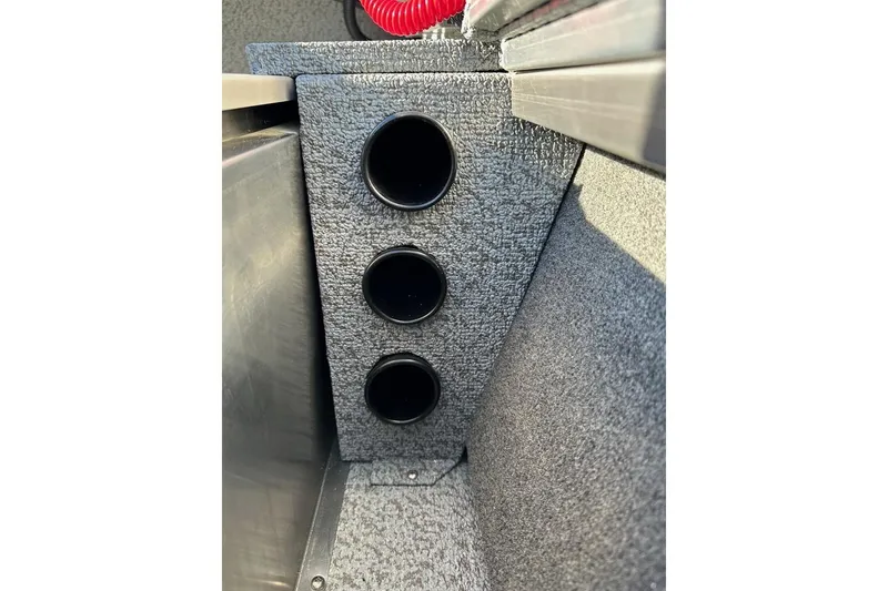 Slide: The Image of 2026 Smoker Craft Angler 16 SC boat interior with three cup holders. - 8