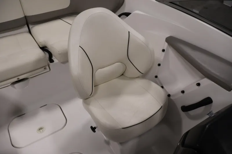 Slide: The Image of 2011 Sea-Doo Challenger 180 interior with white seating and sleek design. - 24