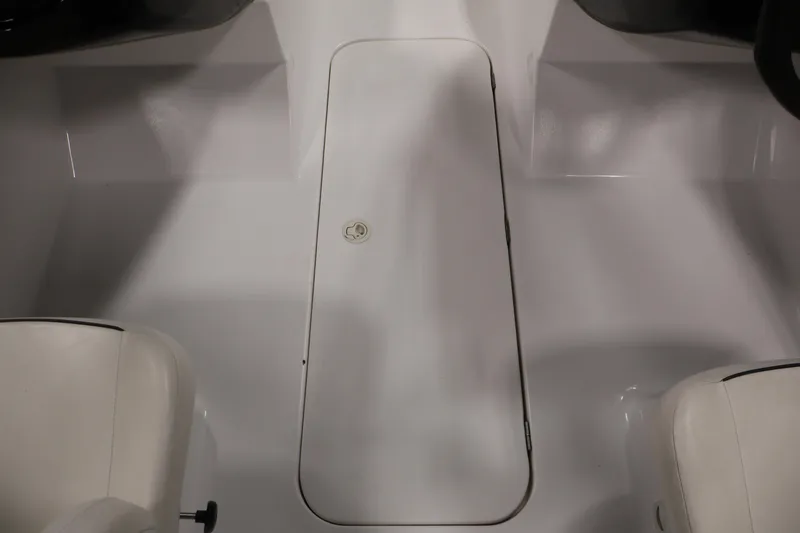 Slide: The Image of 2011 Sea-Doo Challenger 180 boat interior with storage compartment and seating. - 25