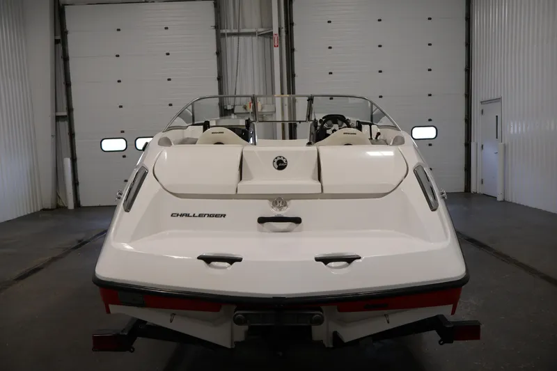Slide: The Image of 2011 Sea-Doo Challenger 180 boat in indoor storage facility. - 6