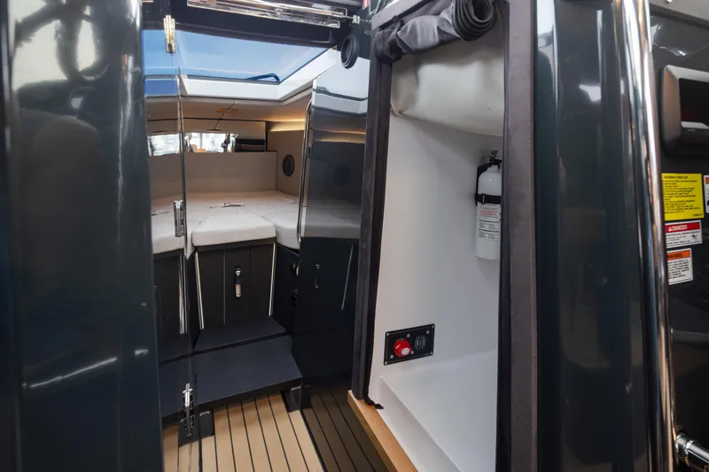 Slide: The Image of Interior cabin of 2023 Arksen 30 Adventure boat, featuring modern design and safety equipment. - 16