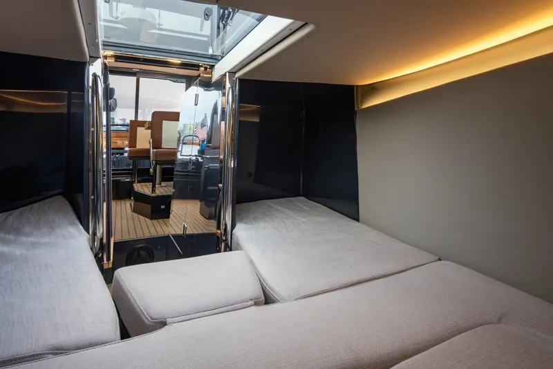 Slide: The Image of Interior of 2023 Arksen 30 Adventure yacht with modern seating and ambient lighting. - 18