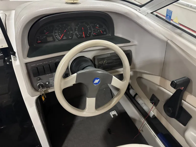 Slide: The Image of Interior view of 1995 Four Winns 245 Sundowner cockpit. - 6