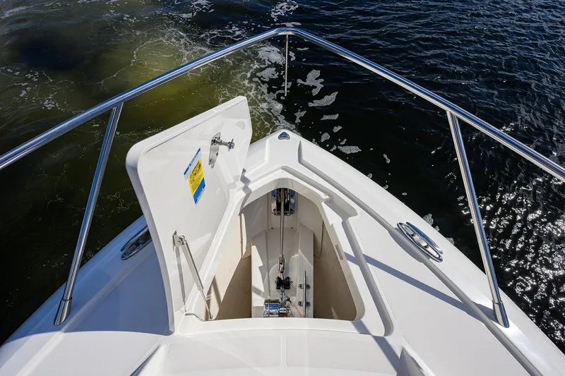 Slide: The Image of Bow view of 2022 Tiara Yachts 43 LE with open anchor locker. - 23