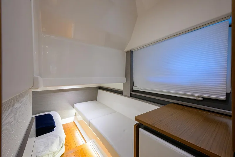 Slide: The Image of Interior cabin of 2022 Tiara Yachts 43 LE, featuring modern design and comfortable seating. - 45