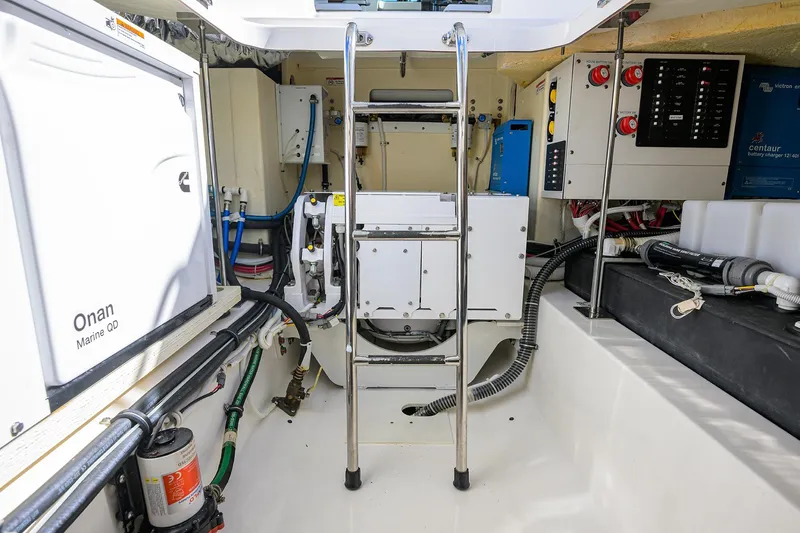 Slide: The Image of Engine room of 2022 Tiara Yachts 43 LE with Onan Marine QD generator. - 50
