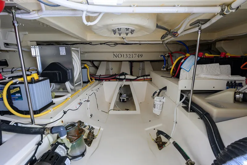 Slide: The Image of Engine room of 2022 Tiara Yachts 43 LE, showcasing wiring and components. - 53
