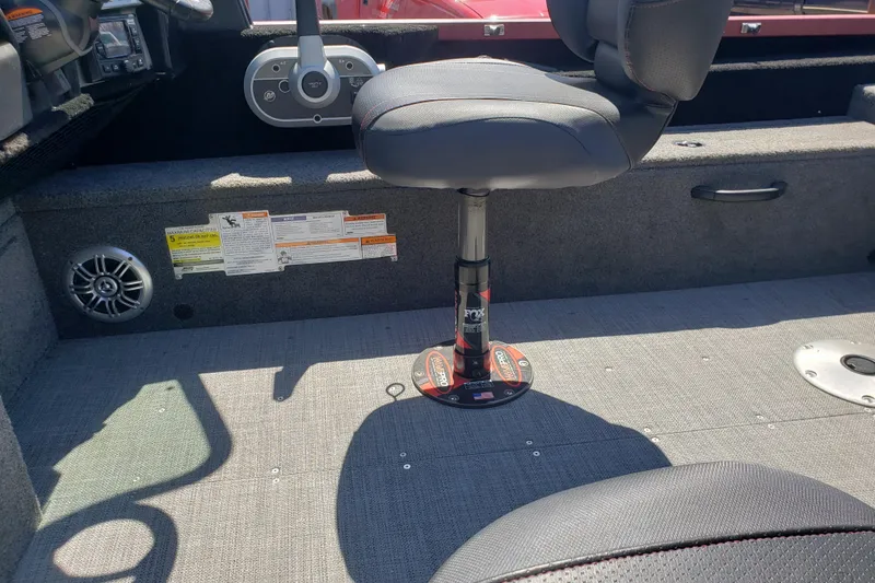 Slide: The Image of 2023 Alumacraft Competitor 175 Sport boat interior with seating and control panel. - 8