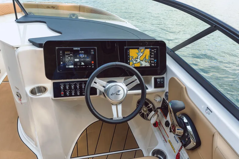 Slide: The Image of 2026 Sea Ray SDX 250 Surf cockpit with advanced navigation systems. - 24