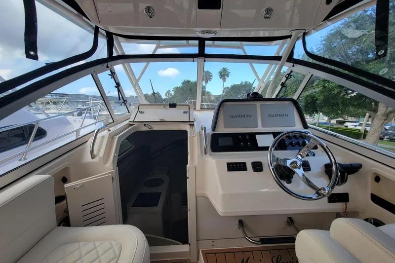 Slide: The Image of Interior view of 2023 Grady-White Marlin 300 boat with Garmin navigation system. - 29
