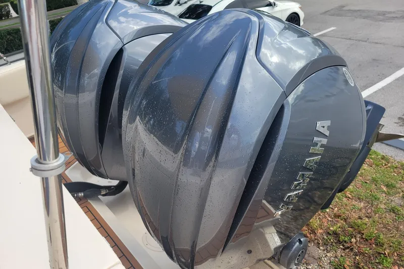 Slide: The Image of Twin Yamaha outboard engines on a 2023 Grady-White Marlin 300 boat. - 7
