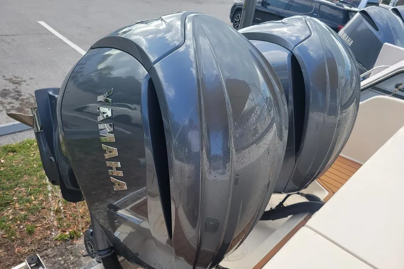 Slide: The Image of Twin Yamaha outboard engines on a 2023 Grady-White Marlin 300 boat. - 8