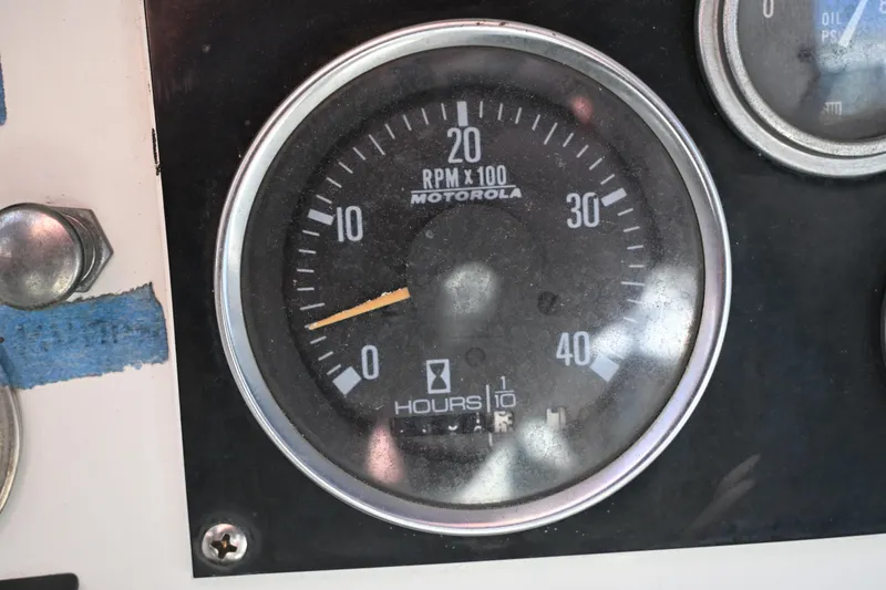 Slide: The Image of Close-up of a Motorola RPM gauge on a 1980 Tartan 37. - 24