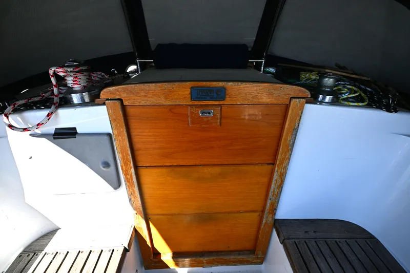 Slide: The Image of Cockpit of a 1980 Tartan 37 sailboat with wooden hatch and winches. - 20
