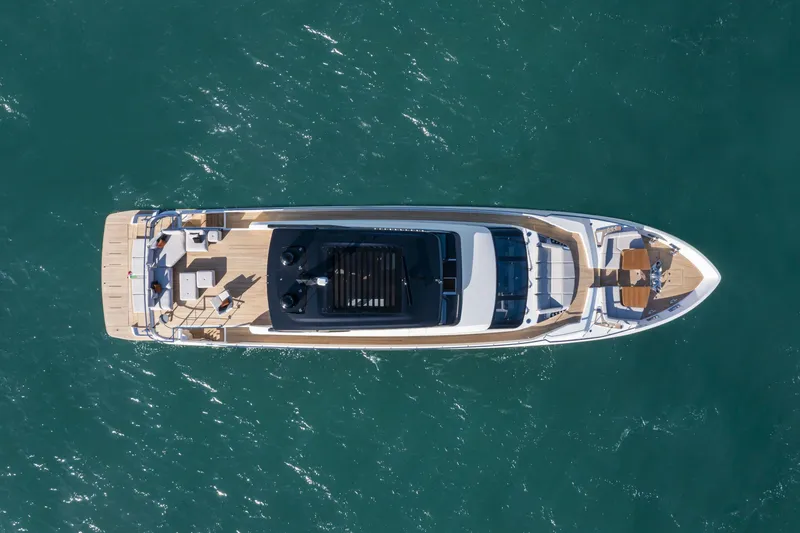 Slide: The Image of Aerial view of Ferretti Yachts 1000, 2027 model, on open sea. - 2