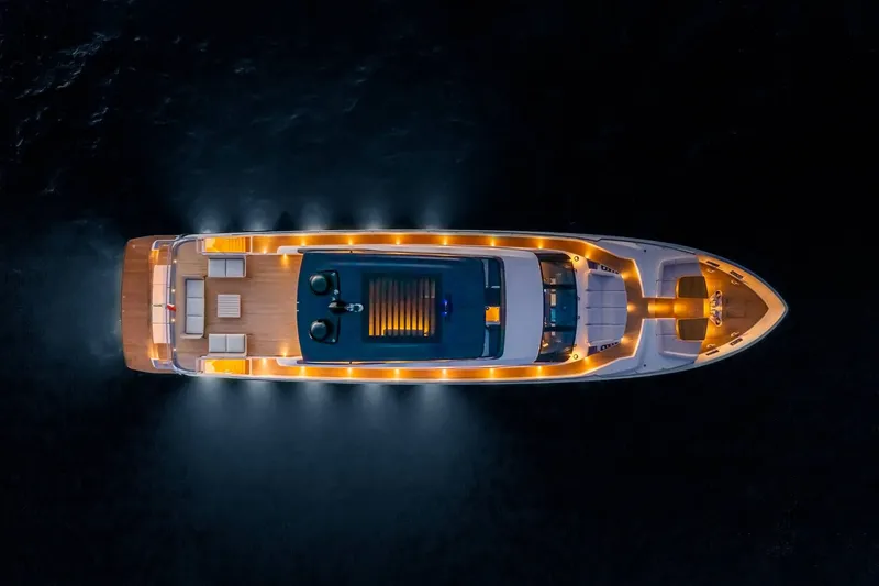 Slide: The Image of Ferretti Yachts 1000 2027, illuminated deck at night, aerial view. - 4