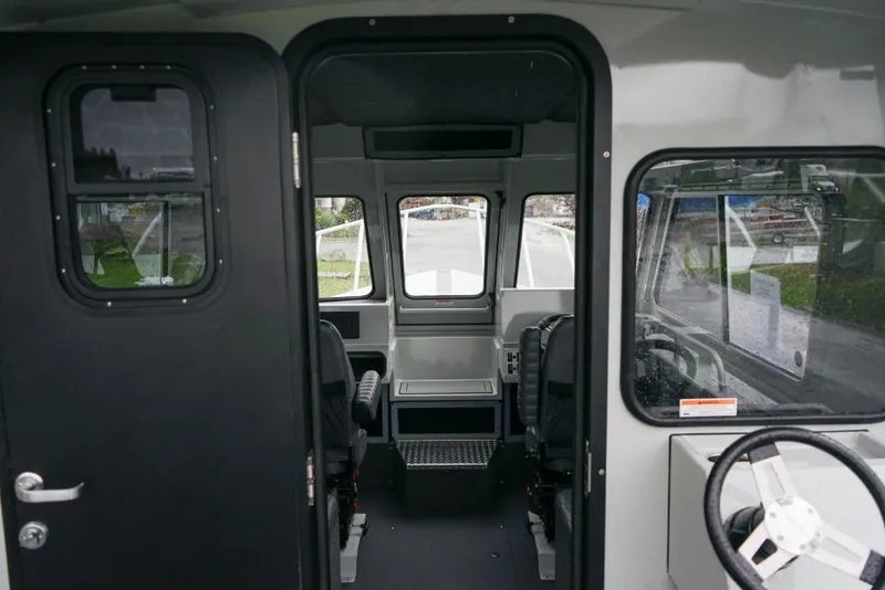 Slide: The Image of Interior view of 2026 Weldcraft 220 Ocean King boat cabin. - 13