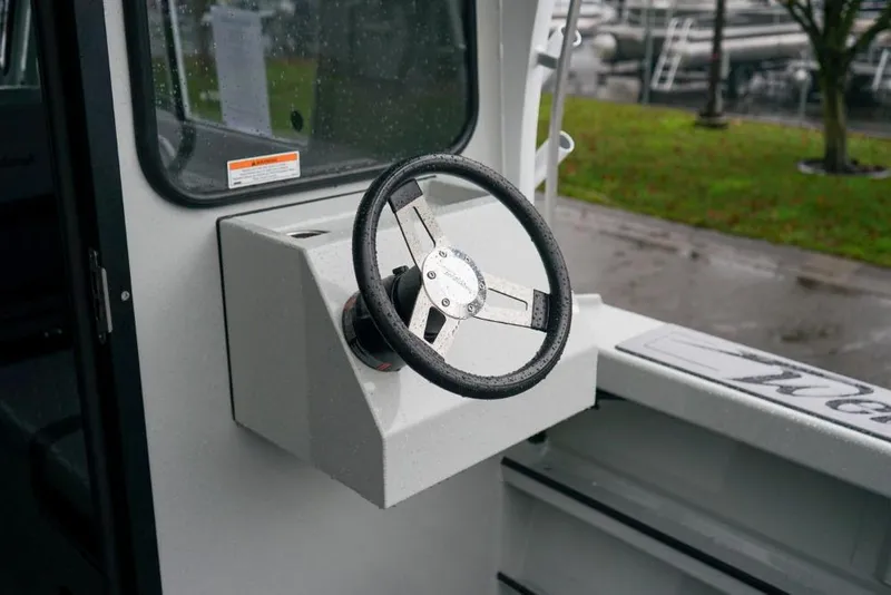 Slide: The Image of Steering wheel of 2026 Weldcraft 220 Ocean King boat, showcasing modern design. - 8