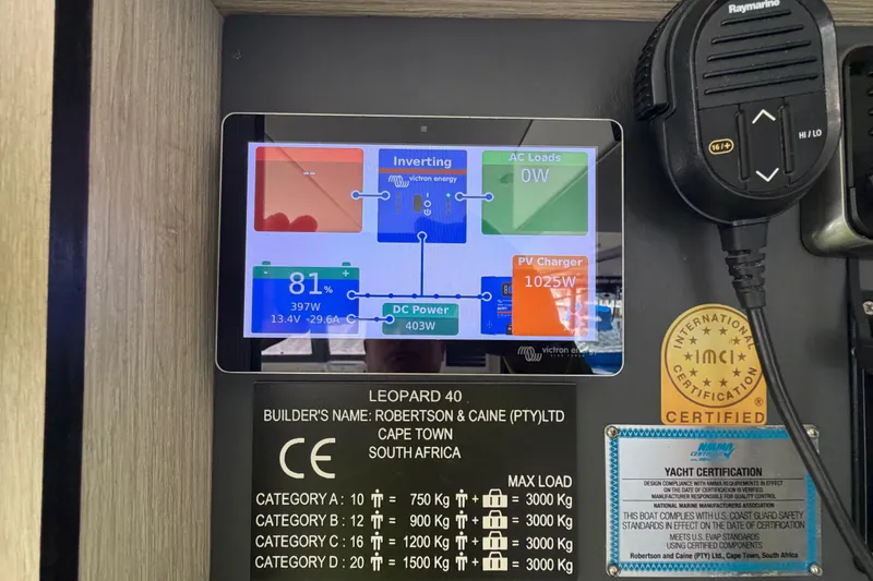 Slide: The Image of Control panel of a 2017 Leopard 40 yacht, displaying power management and certification details. - 103