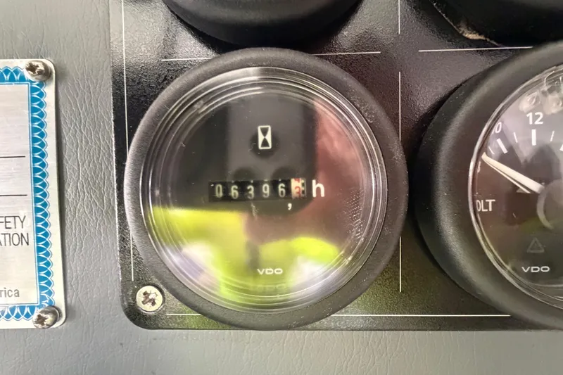 Slide: The Image of Hour meter reading 6396 on a 2017 Leopard 40 dashboard. - 105