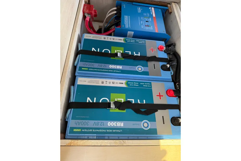Slide: The Image of Lithium-ion batteries and inverter setup in a 2017 Leopard 40 yacht. - 117