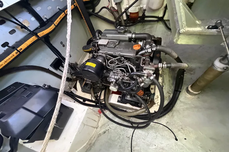 Slide: The Image of Engine compartment of a 2017 Leopard 40 catamaran, showcasing detailed mechanical components. - 119
