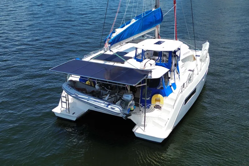 Slide: The Image of 2017 Leopard 40 catamaran with solar panels on water. - 27