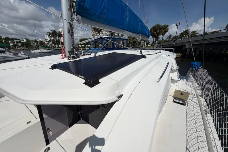 Slide: The Image of 2017 Leopard 40 catamaran deck with solar panel and blue sail cover. - 52