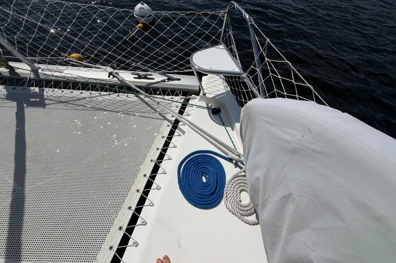 Slide: The Image of Deck of 2017 Leopard 40 catamaran with ropes and netting, overlooking the water. - 63