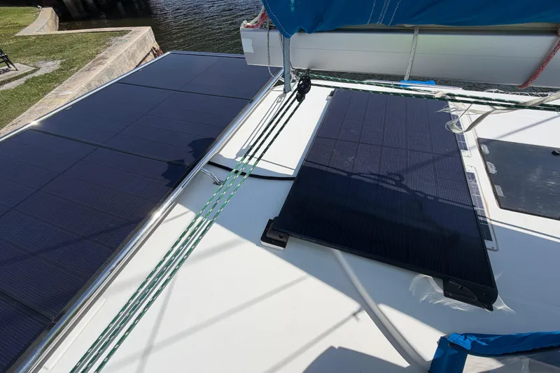Slide: The Image of Solar panels on a 2017 Leopard 40 catamaran deck, harnessing renewable energy. - 71
