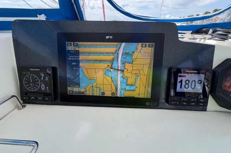 Slide: The Image of Navigation system on a 2017 Leopard 40 catamaran, displaying maps and sailing data. - 76