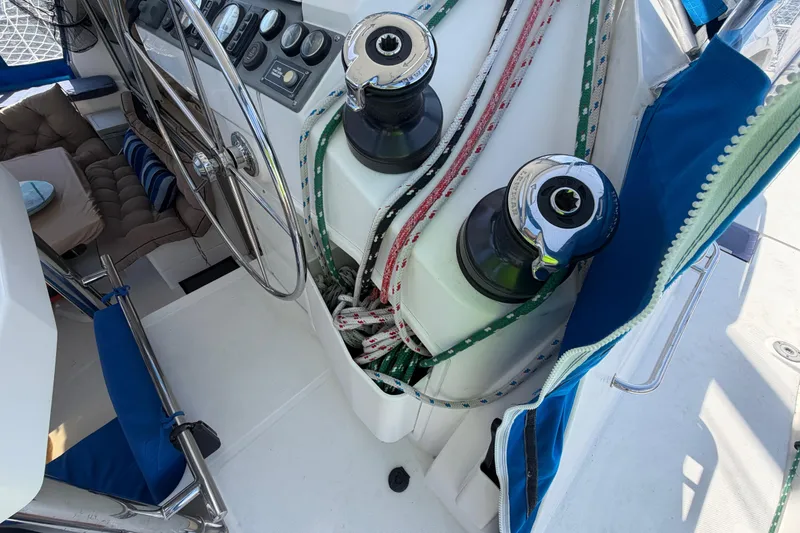 Slide: The Image of Cockpit of 2017 Leopard 40 yacht with steering wheel and winches. - 77