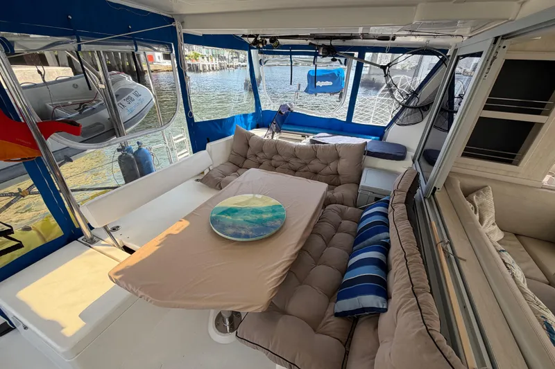 Slide: The Image of Luxurious interior of a 2017 Leopard 40 catamaran with plush seating and nautical decor. - 81