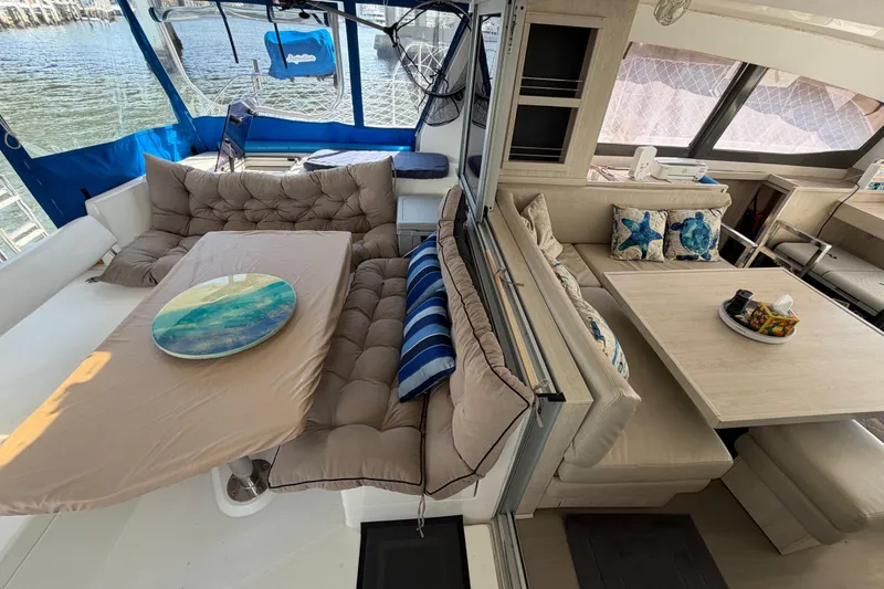Slide: The Image of Luxurious interior of a 2017 Leopard 40 catamaran with plush seating and nautical decor. - 83