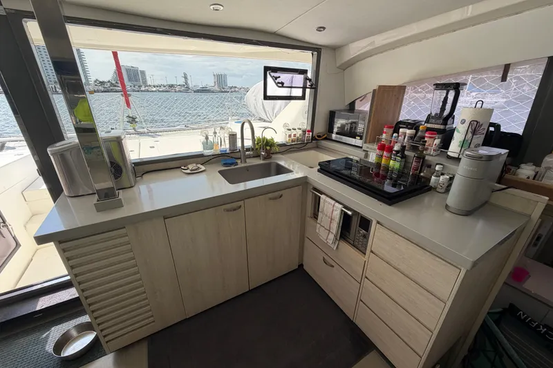 Slide: The Image of Modern kitchen interior on a 2017 Leopard 40 catamaran with ocean view. - 98