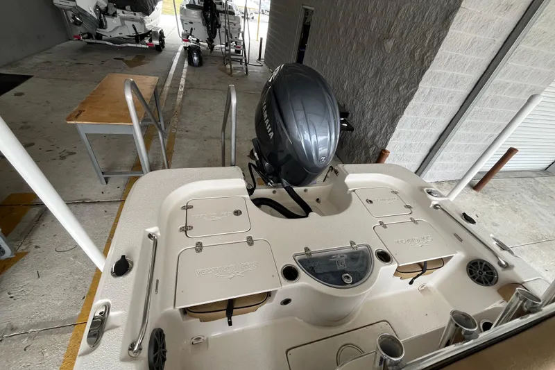 Slide: The Image of 2024 Sea Chaser 21 LX boat with Yamaha outboard motor in storage facility. - 20