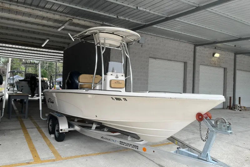 Slide: The Image of 2024 Sea Chaser 21 LX boat on trailer in covered storage area. - 30