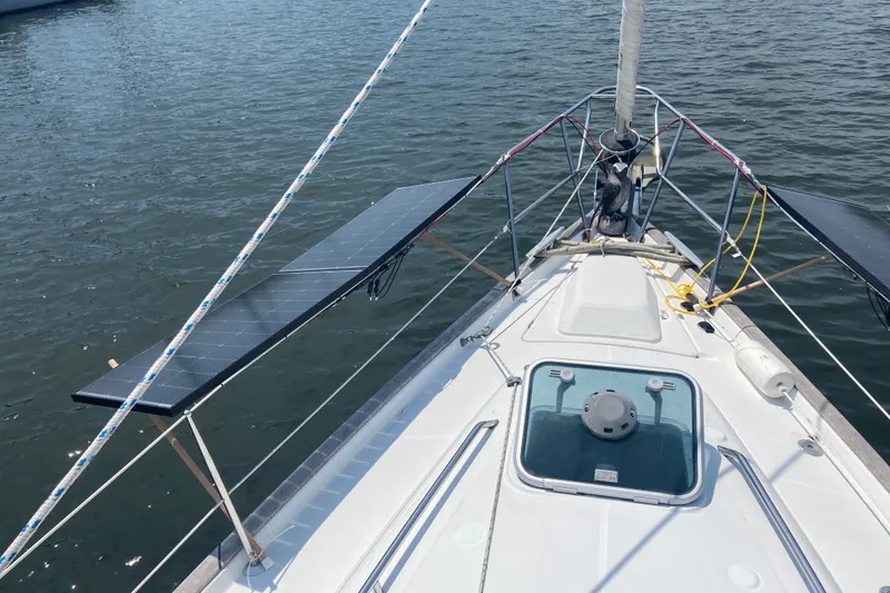 Slide: The Image of Beneteau Oceanis Clipper 411 sailboat deck with solar panels, 2000 model. - 2