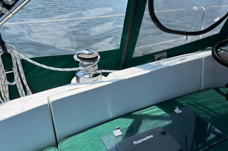Slide: The Image of Cockpit view of 2000 Beneteau Oceanis Clipper 411 sailboat with winch and ropes. - 42