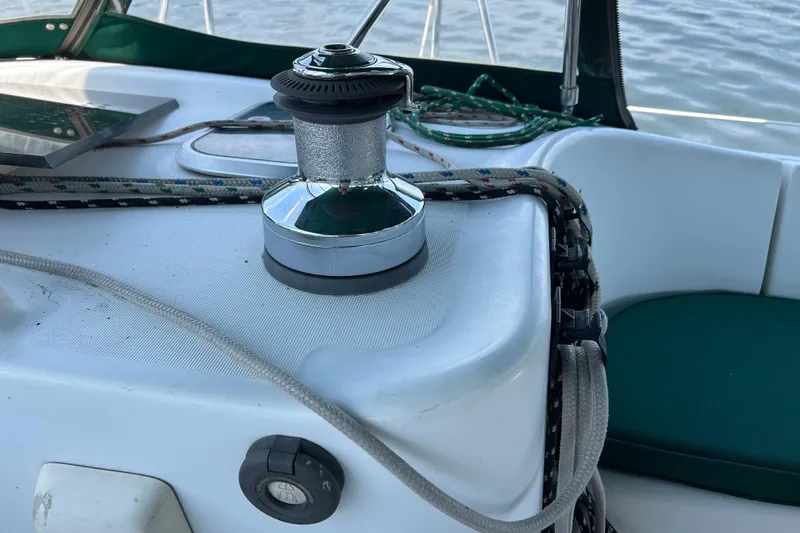 Slide: The Image of Winch and ropes on a 2000 Beneteau Oceanis Clipper 411 sailboat deck. - 40