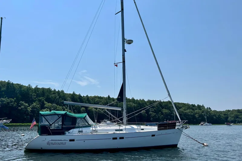Slide: The Image of Beneteau Oceanis Clipper 411 sailboat from 2000 anchored on a sunny day. - 2