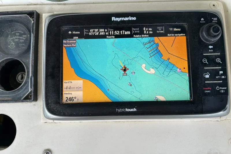 Slide: The Image of Raymarine navigation display on 2000 Beneteau Oceanis Clipper 411, showing nautical chart and heading. - 45