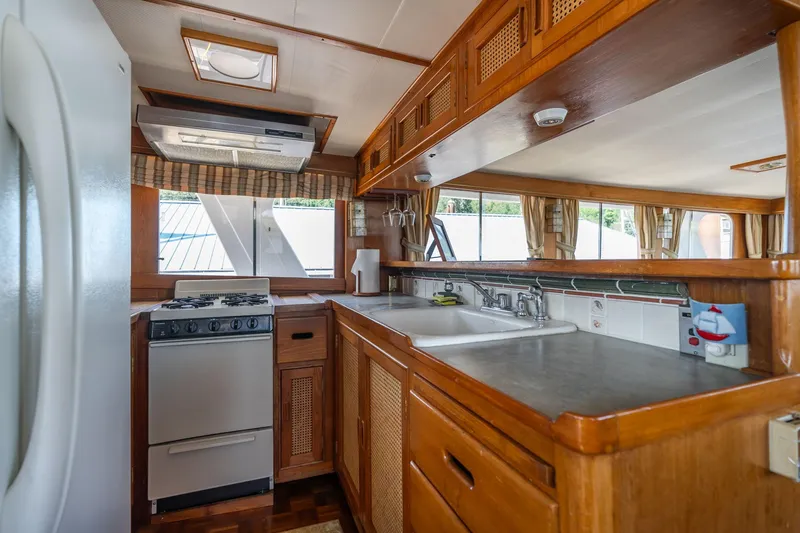 Slide: The Image of Interior of 1976 Grand Banks 52 Europa yacht kitchen. - 12
