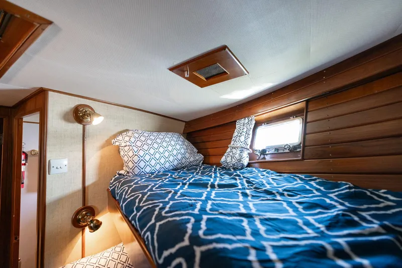 Slide: The Image of Interior of 1976 Grand Banks 52 Europa with cozy bed. - 18