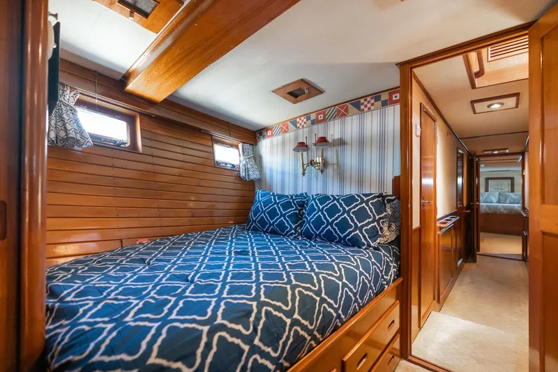 Slide: The Image of Interior of 1976 Grand Banks 52 Europa yacht featuring cozy bedroom. - 21