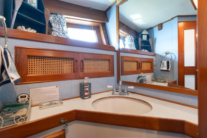 Slide: The Image of 1976 Grand Banks 52 Europa interior, bathroom with sink and mirror. - 25