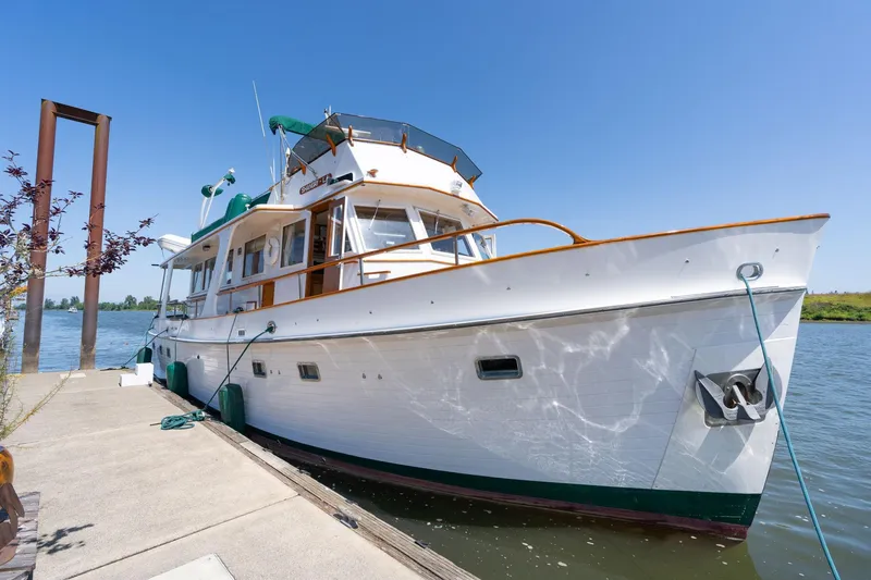 Slide: The Image of Grand Banks 52 Europa 1976 docked on a sunny day. - 3
