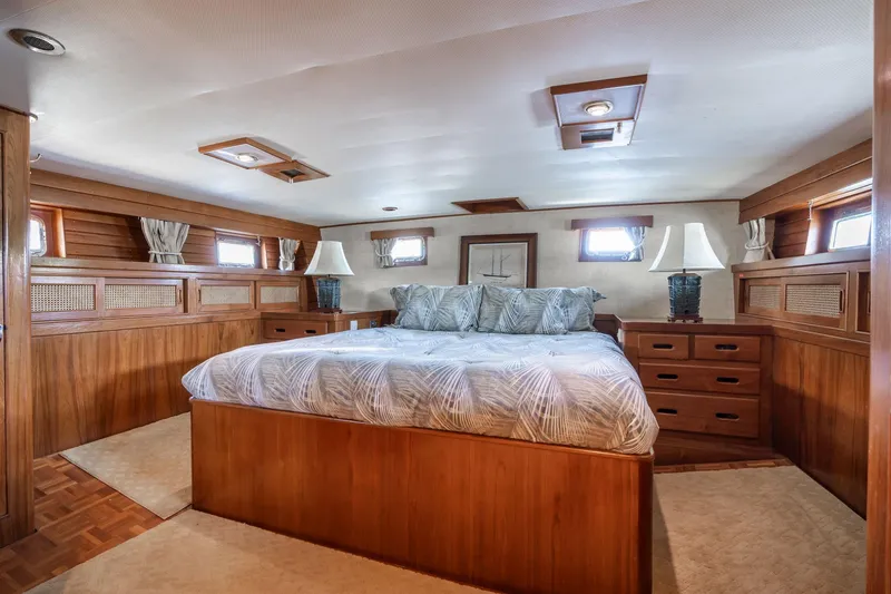 Slide: The Image of Luxurious bedroom on Grand Banks 52 Europa yacht, year 1976. - 30