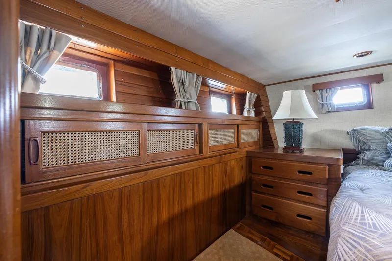 Slide: The Image of Interior of Grand Banks 52 Europa yacht, wood furnishings and windows. - 32