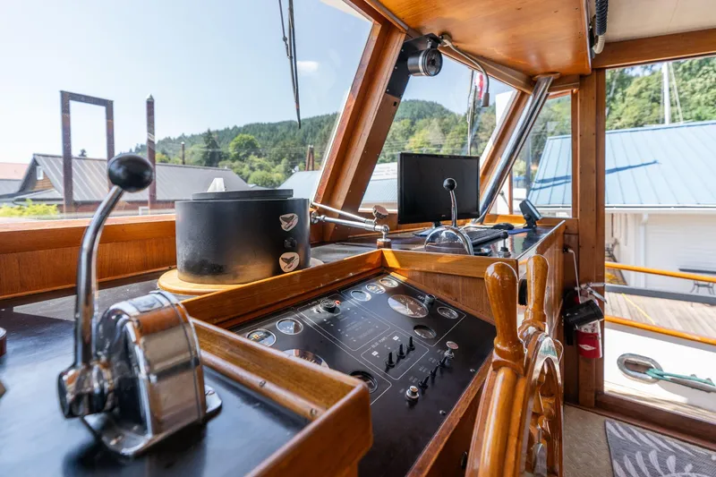 Slide: The Image of Interior view of the helm on a 1976 Grand Banks 52 Europa. - 38